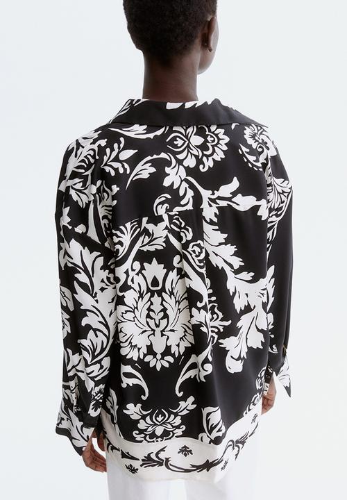H&M - Loose-fit shirt - black/patterned