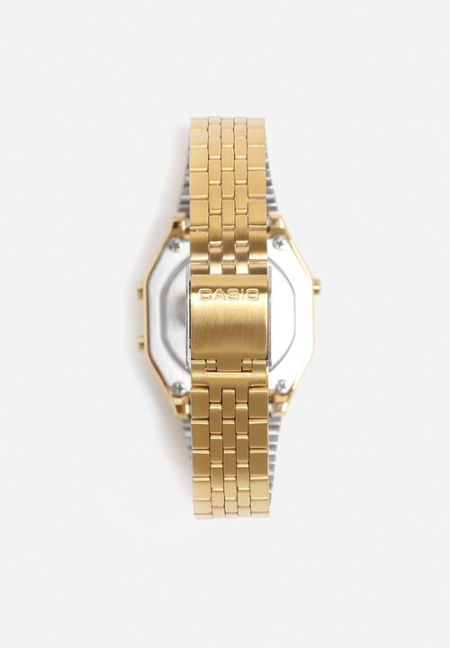 gold casio watch on wrist