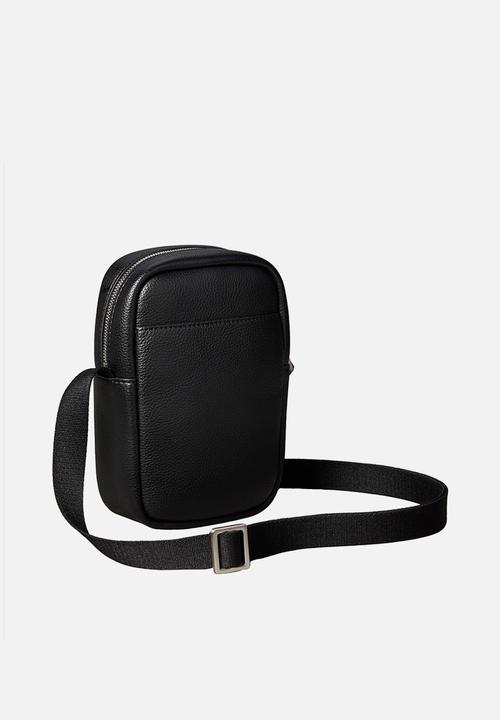 Calvin Klein - Raised Slim Reporter - Black