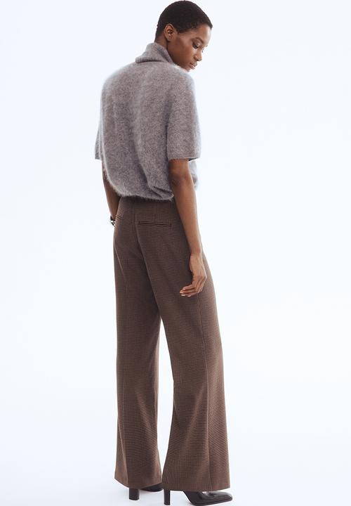 H&M - Bootcut trousers - dark beige/dogtooth pattern