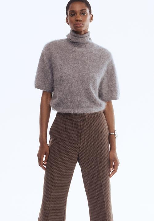 H&M - Bootcut trousers - dark beige/dogtooth pattern