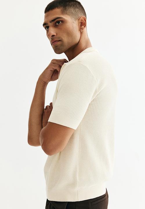 H&M - Regular fit knitted polo shirt - cream