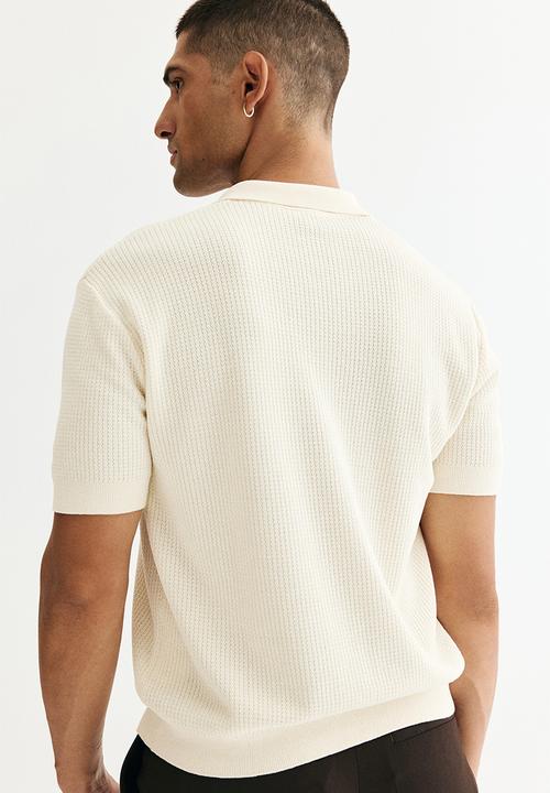 H&M - Regular fit knitted polo shirt - cream