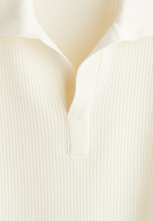H&M - Regular fit knitted polo shirt - cream