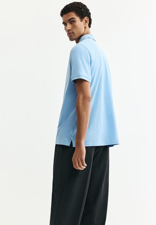 H&M - Regular fit pique polo shirt - blue