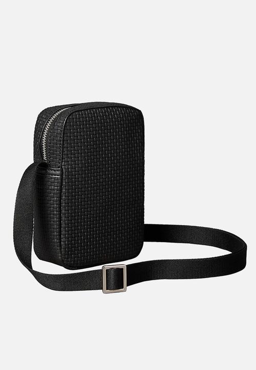 Calvin Klein - Embossed Woven Slim Reporter - Black