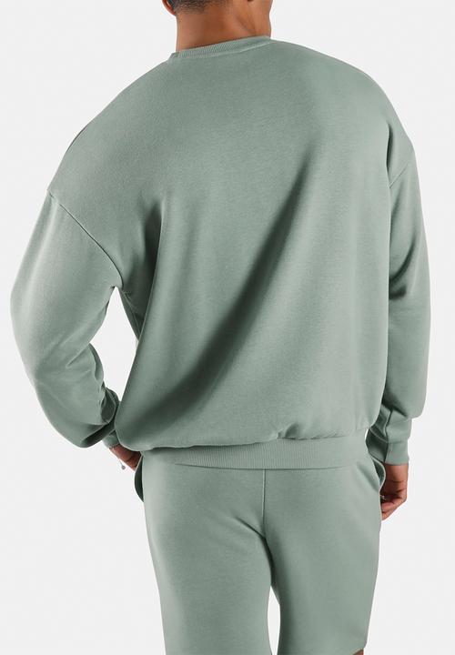 Reebok - BACK FADE CREW SWEATSHIRT - LIGHT FOG Green