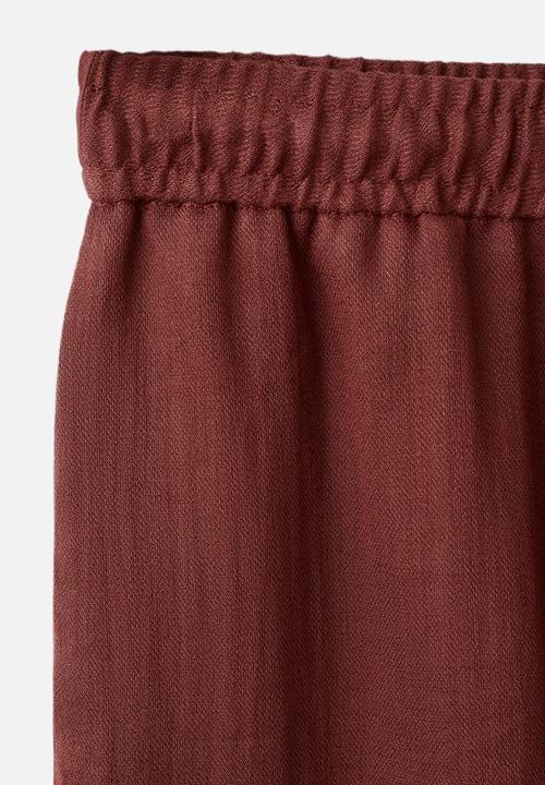 MANGO - Trousers salvia - red