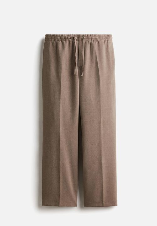 H&M - Relaxed fit trousers - beige marl