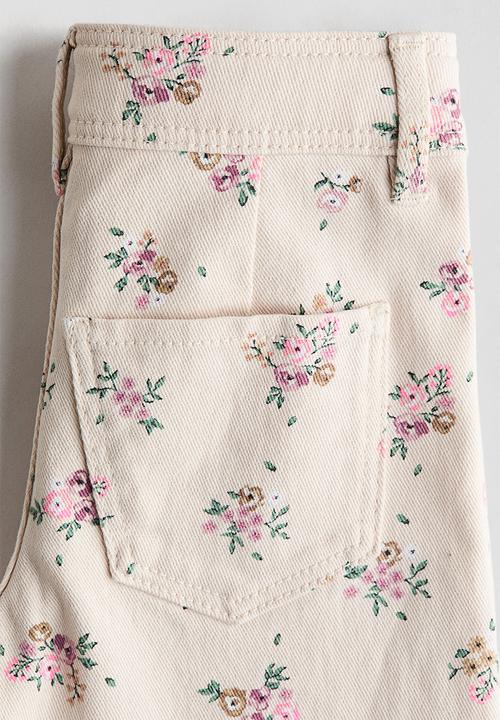 H&M - Wide patterned twill trousers - light beige/floral