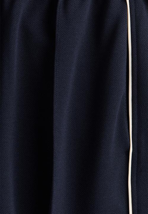 H&M - Wide crease-front trousers - navy blue