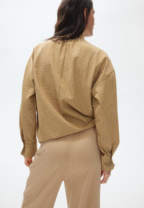 H&M - Wide crease-front trousers - beige