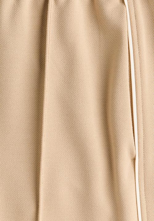 H&M - Wide crease-front trousers - beige