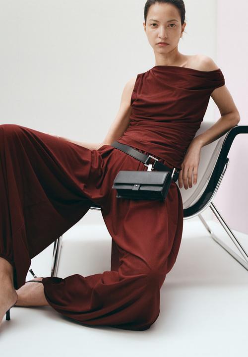 MANGO - Trousers corini - rust/copper