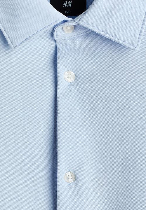 H&M - Four-way stretch slim fit shirt - light blue