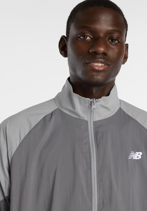 New Balance  - NB Athletics Sport Legacy Jacket - Grey