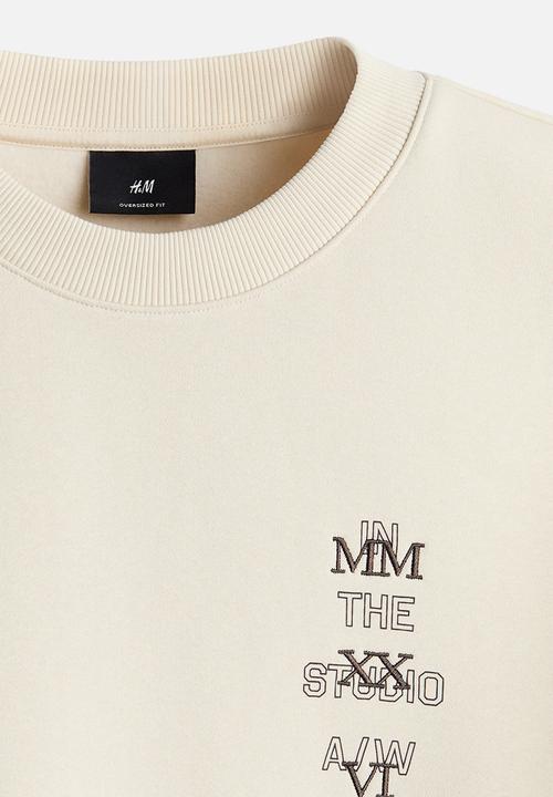 H&M - Oversized fit printed sweatshirt - light beige/in the studio