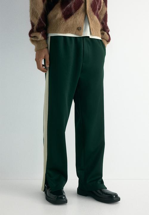 H&M - Relaxed fit sweatpants with side stripes - dark green/colour block