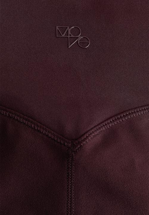 H&M - Flared yoga leggings with softmove? - chocolate plum purple