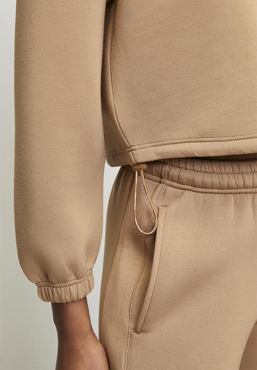 Steve Madden - Ladies nora 1/4 zip scuba sweat - mid caramel