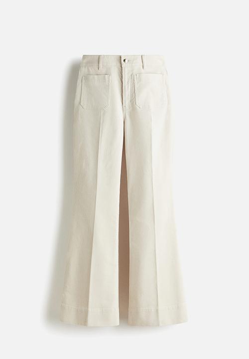 H&M - Flared corduroy trousers - light beige