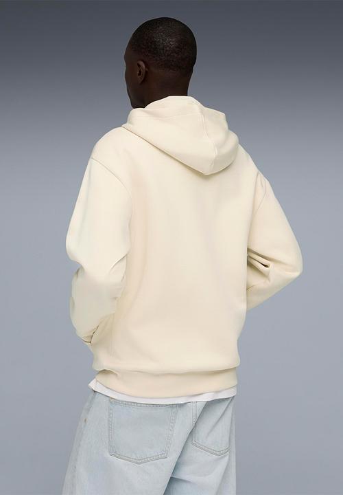 PUMA - ESS ELEVATED CAT LOGO Relaxed Hoodie DK - Alpine Snow