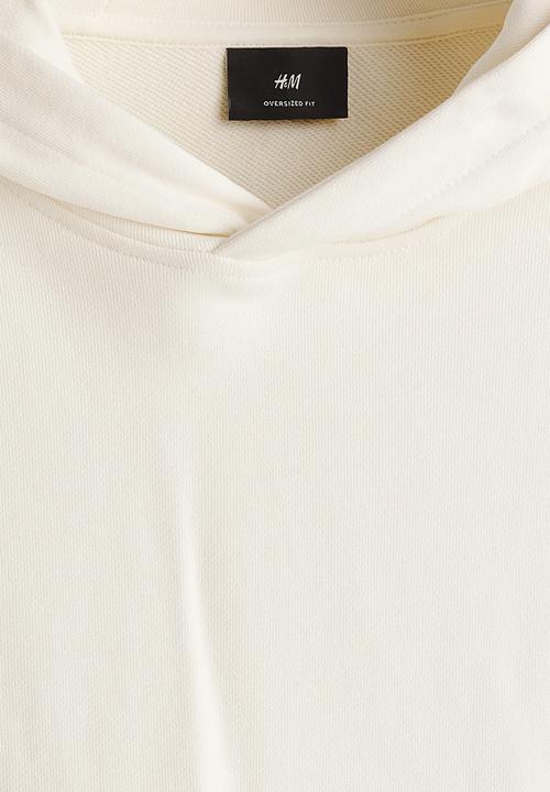 H&M - Oversized fit printed hoodie - cream/all is fading