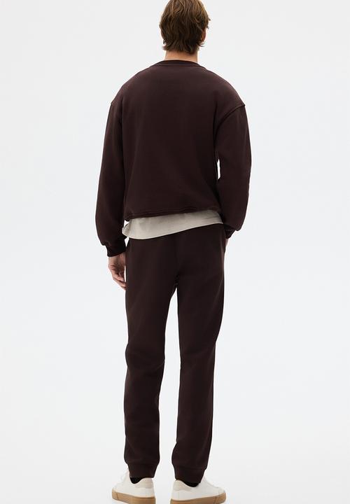 H&M - Regular fit interlock sweatpants - dark brown