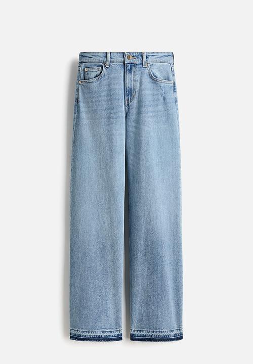 H&M - Wide high waist jeans - light denim blue