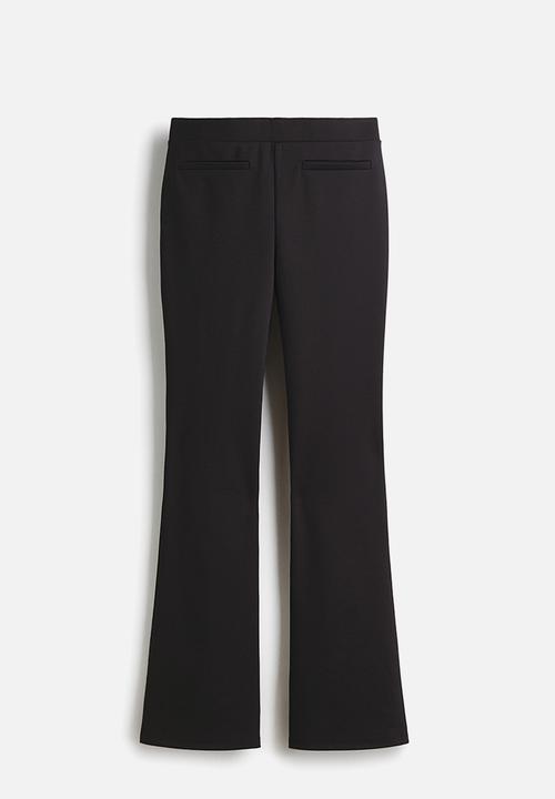 H&M - Flared trousers - black