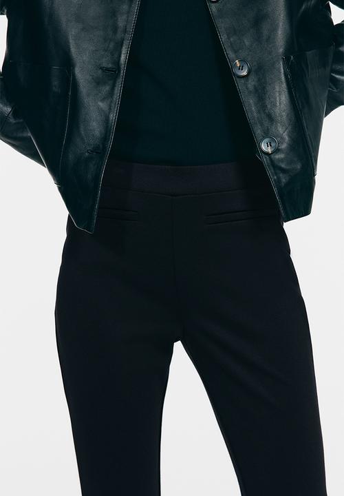 H&M - Flared trousers - black