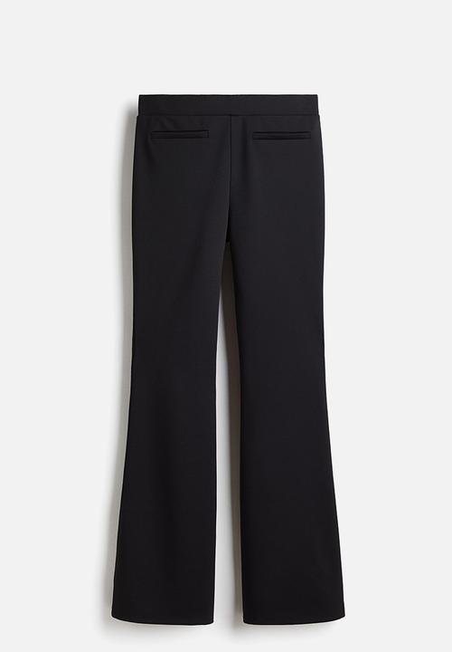 H&M - Flared trousers - black