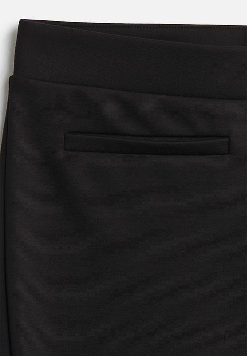 H&M - Flared trousers - black