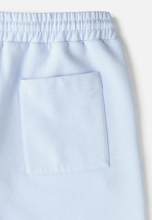 H&M - Lotto H&M: Regular fit sweatshorts - light blue/lotto