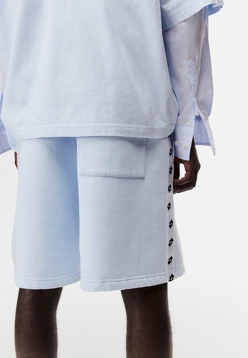 H&M - Lotto H&M: Regular fit sweatshorts - light blue/lotto