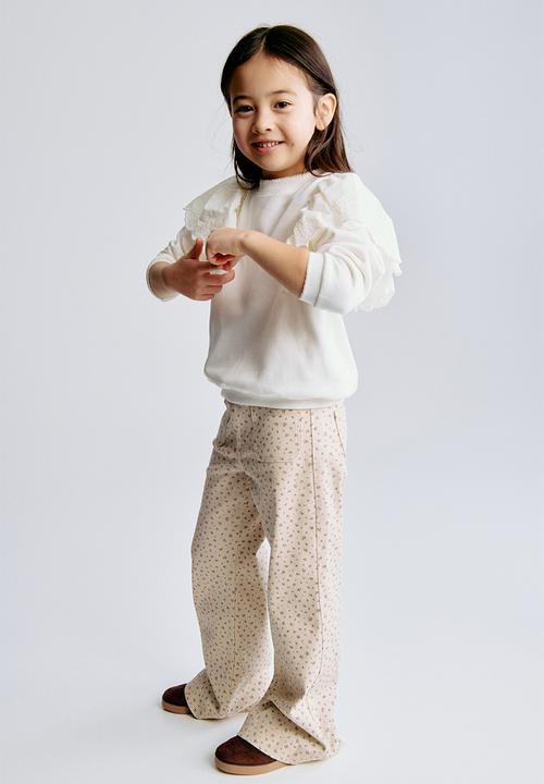 H&M - Flared jeans - beige/floral