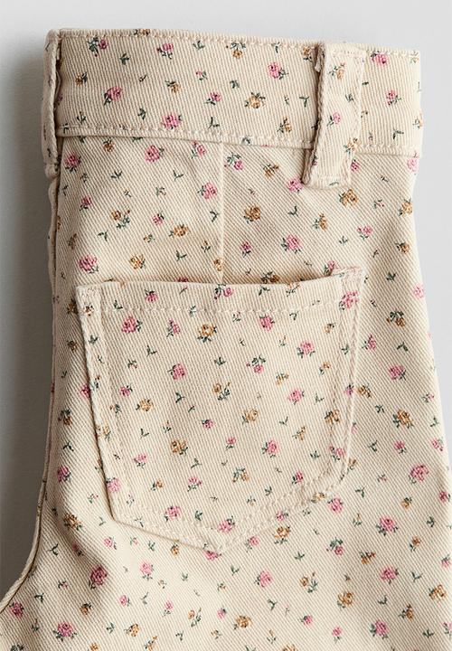 H&M - Flared jeans - beige/floral