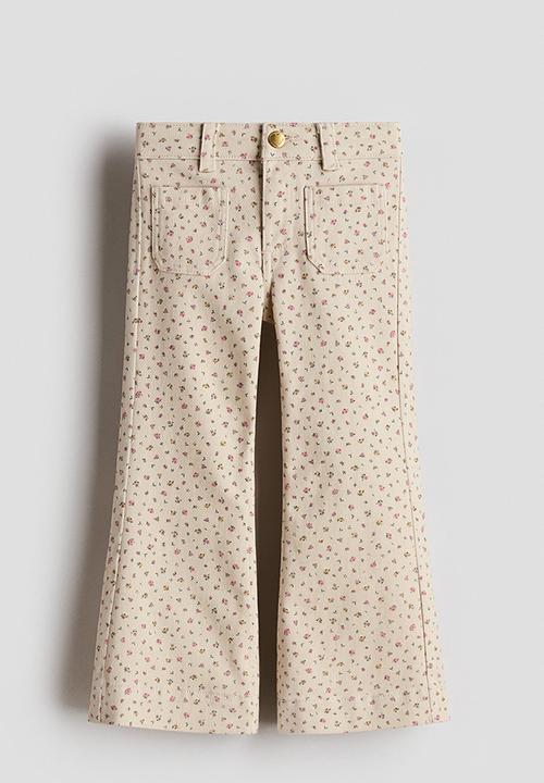 H&M - Flared jeans - beige/floral