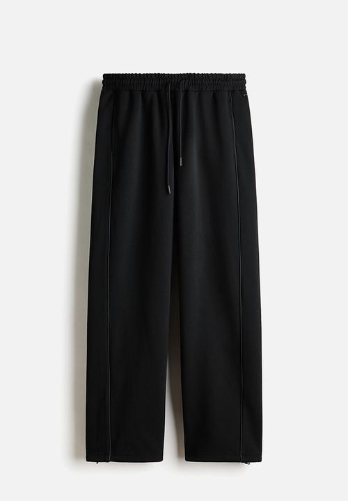 H&M - Loose fit sports joggers - black