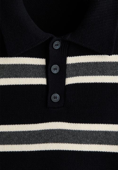 H&M - Loose fit knitted polo shirt - dark blue/striped