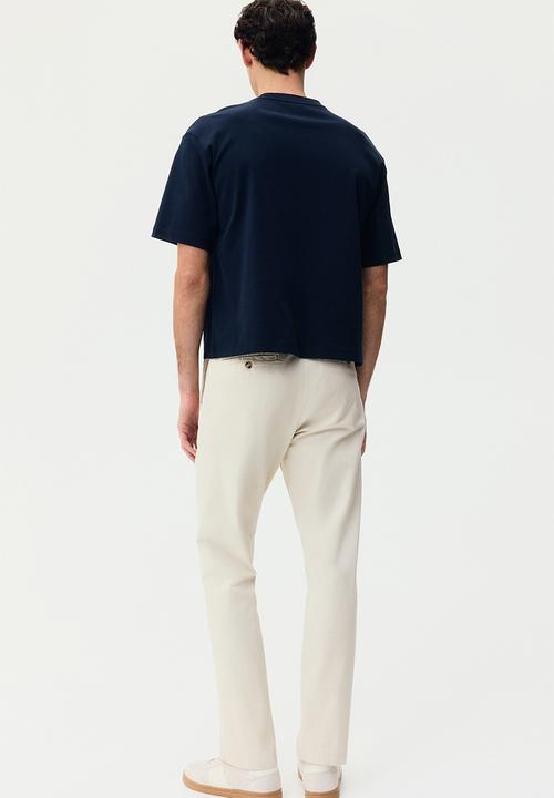 H&M - Slim fit cotton chinos - light beige