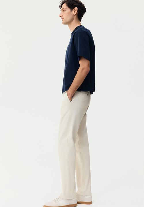 H&M - Slim fit cotton chinos - light beige