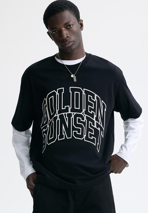 H&M - Loose fit printed t-shirt - black/golden sunset
