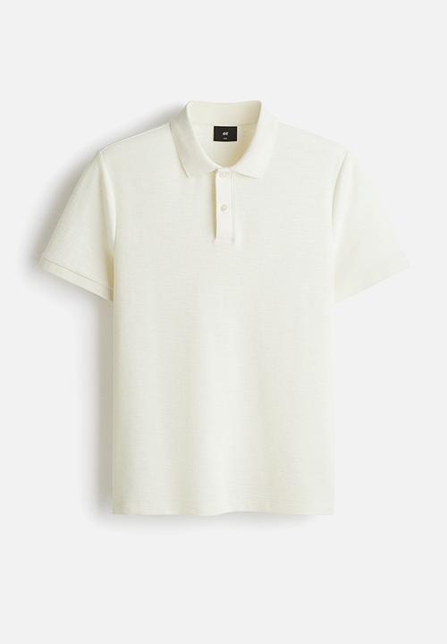 H&M - Slim fit jacquard-knit polo shirt - cream