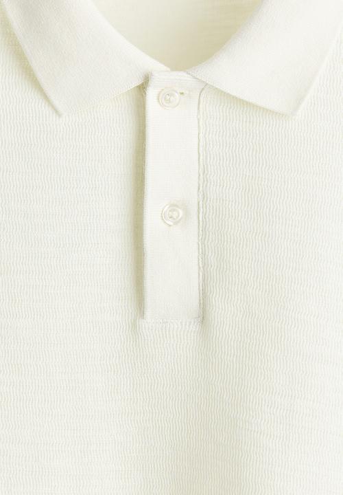 H&M - Slim fit jacquard-knit polo shirt - cream