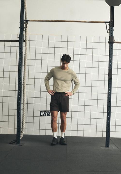 H&M - Regular fit long-sleeve sports top with drymove - light beige