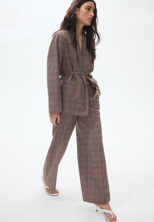 H&M - Straight tailored trousers - dark beige/checked