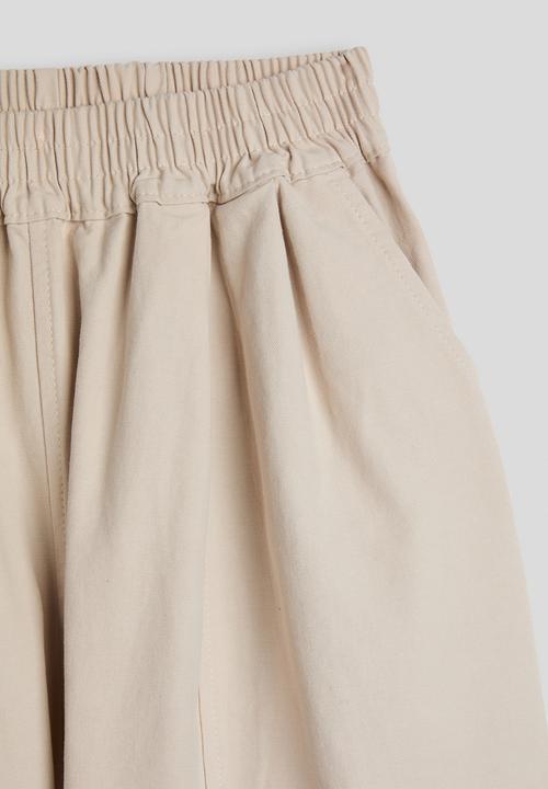 Pop Candy - Frayed edged cuff wide leg pants - desert sand