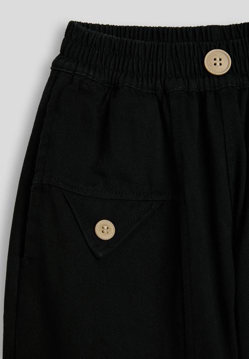 Pop Candy - Twill barrel pants with asymmetrical stylized pockets - black