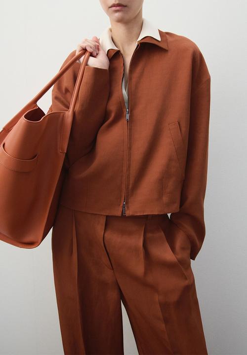 MANGO - Trousers vbbargan - rust/copper